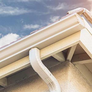 Seamles white k-style gutters closeup